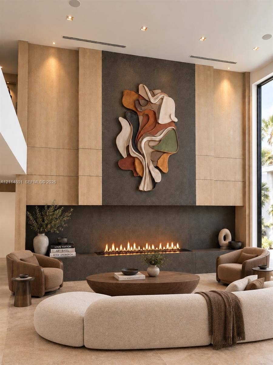 2218 NE 16th Street, Fort Lauderdale, FL 33304 Floor-to-ceiling accent wall featuring integrated light wood paneling, dark tile surround, horizontal linear fireplace, and recessed ceiling lighting