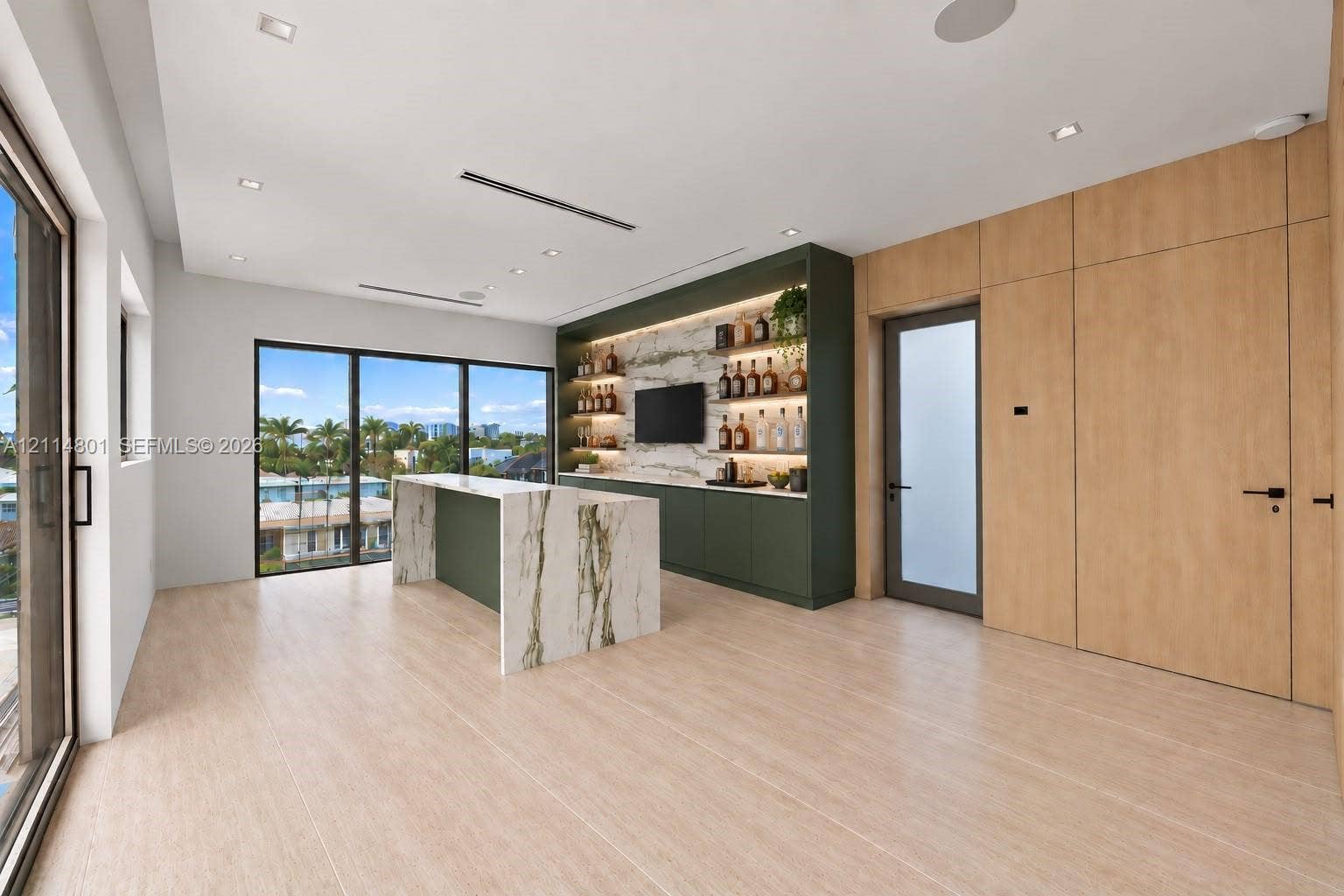 2218 NE 16th Street, Fort Lauderdale, FL 33304 Custom wet bar featuring integrated stone-topped cabinetry, built-in shelving with recessed accent lighting, floor-to-ceiling wood paneling, wood-finish flooring, and expansive glass sliding doors