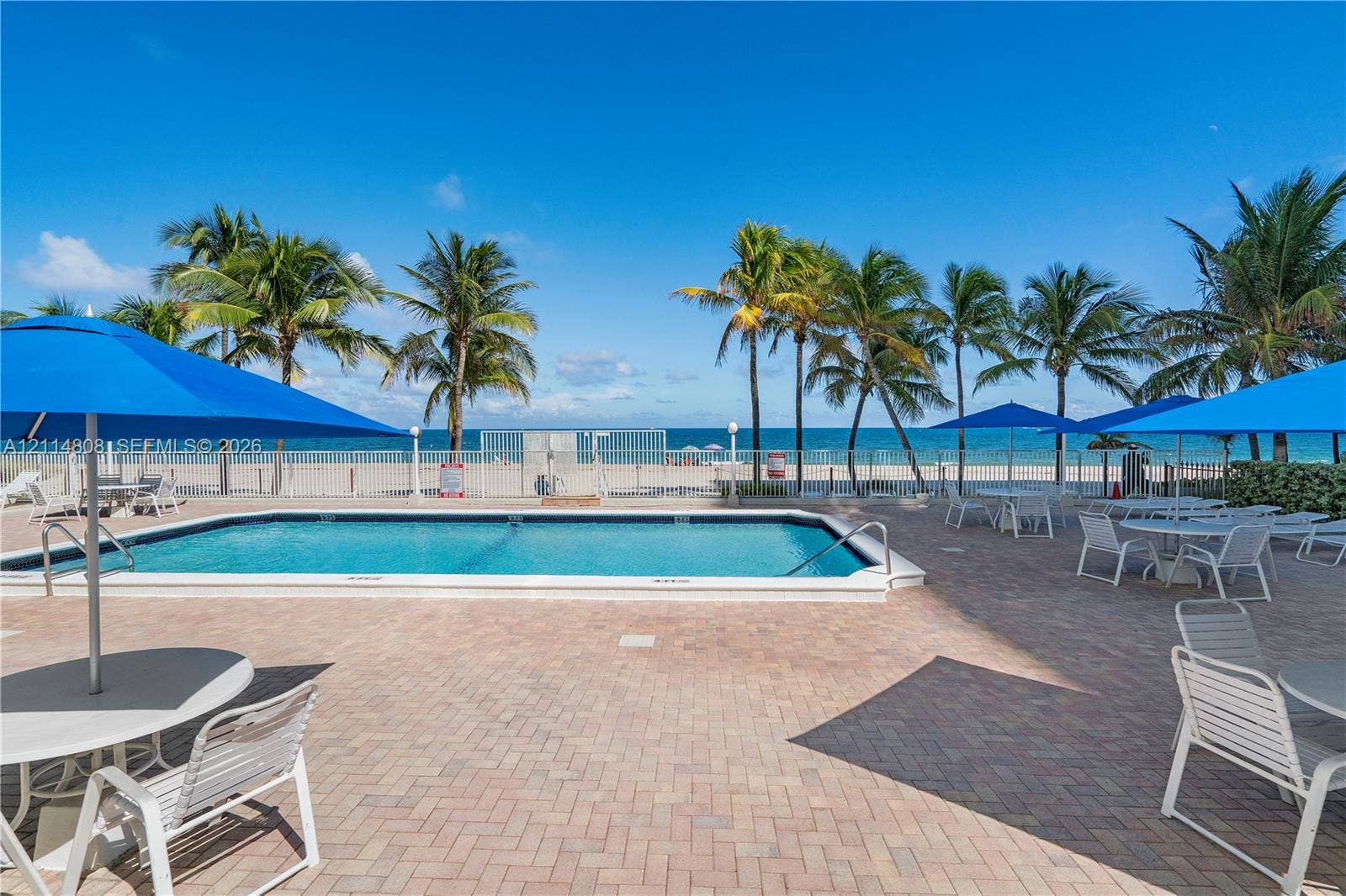 1000 S Ocean Boulevard, #16P, Pompano Beach, Pompano Beach, FL 33062 Swimming pool with paver decking, perimeter metal fencing, and ocean frontage