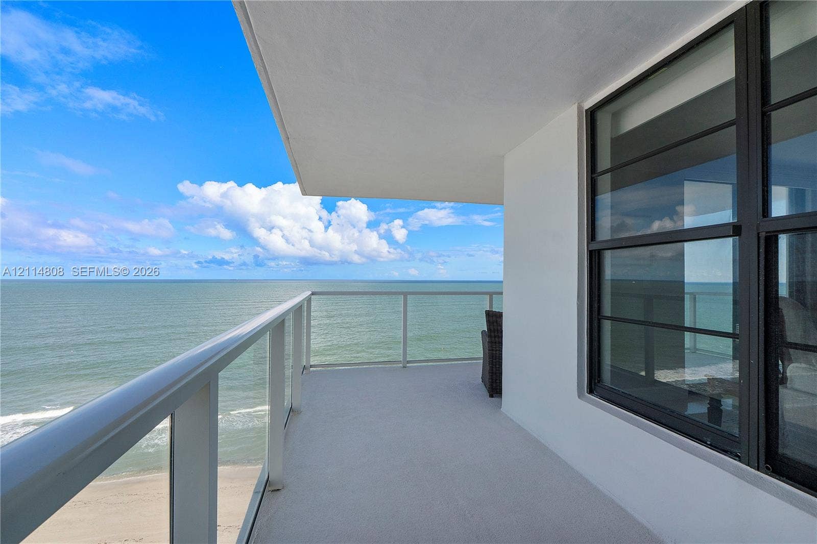 1000 S Ocean Boulevard, #16P, Pompano Beach, Pompano Beach, FL 33062 Private covered balcony featuring a glass panel railing, concrete flooring, and direct ocean exposure