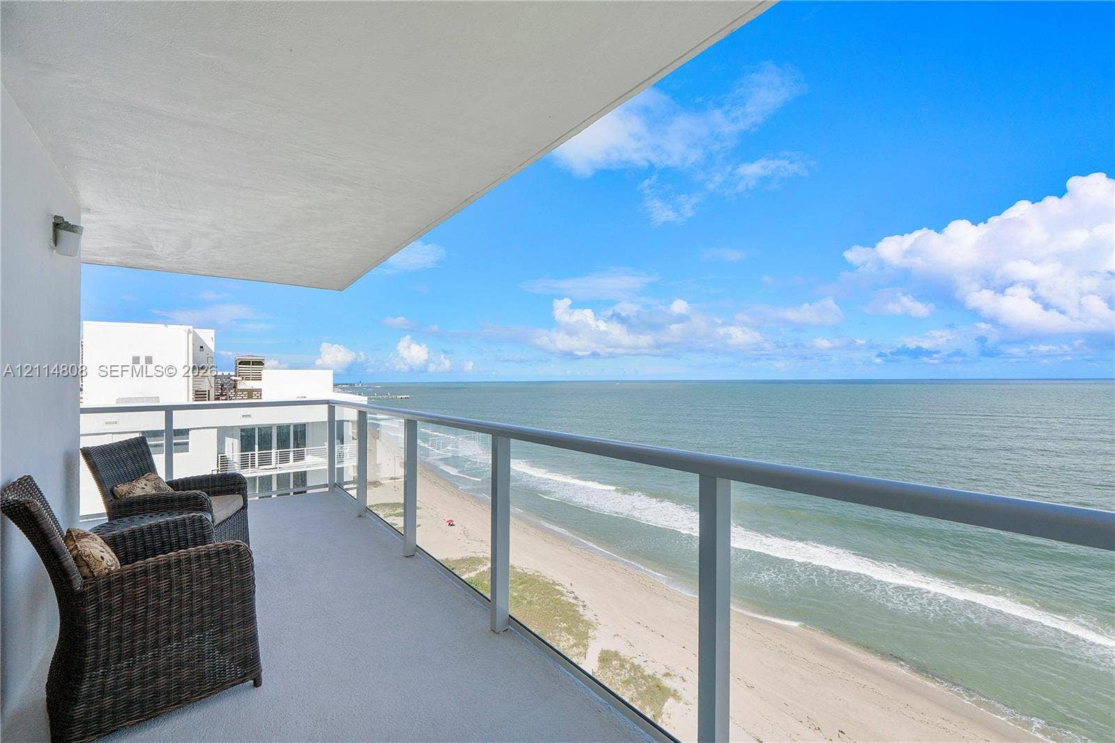 1000 S Ocean Boulevard, #16P, Pompano Beach, Pompano Beach, FL 33062 Private balcony with a concrete floor, protective glass railing, and structural overhang