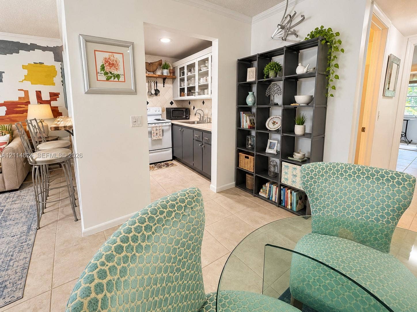 563 Durham T, #563, Deerfield Beach, FL 33442 Kitchen featuring grey lower cabinetry, white upper cabinetry with glass-front accents, and tile flooring
