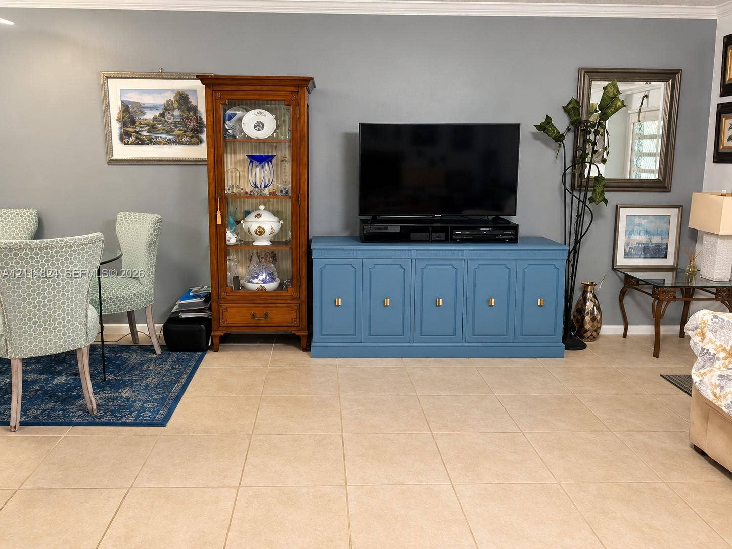 563 Durham T, #563, Deerfield Beach, FL 33442 Living area featuring large-format ceramic tile flooring and neutral wall paint