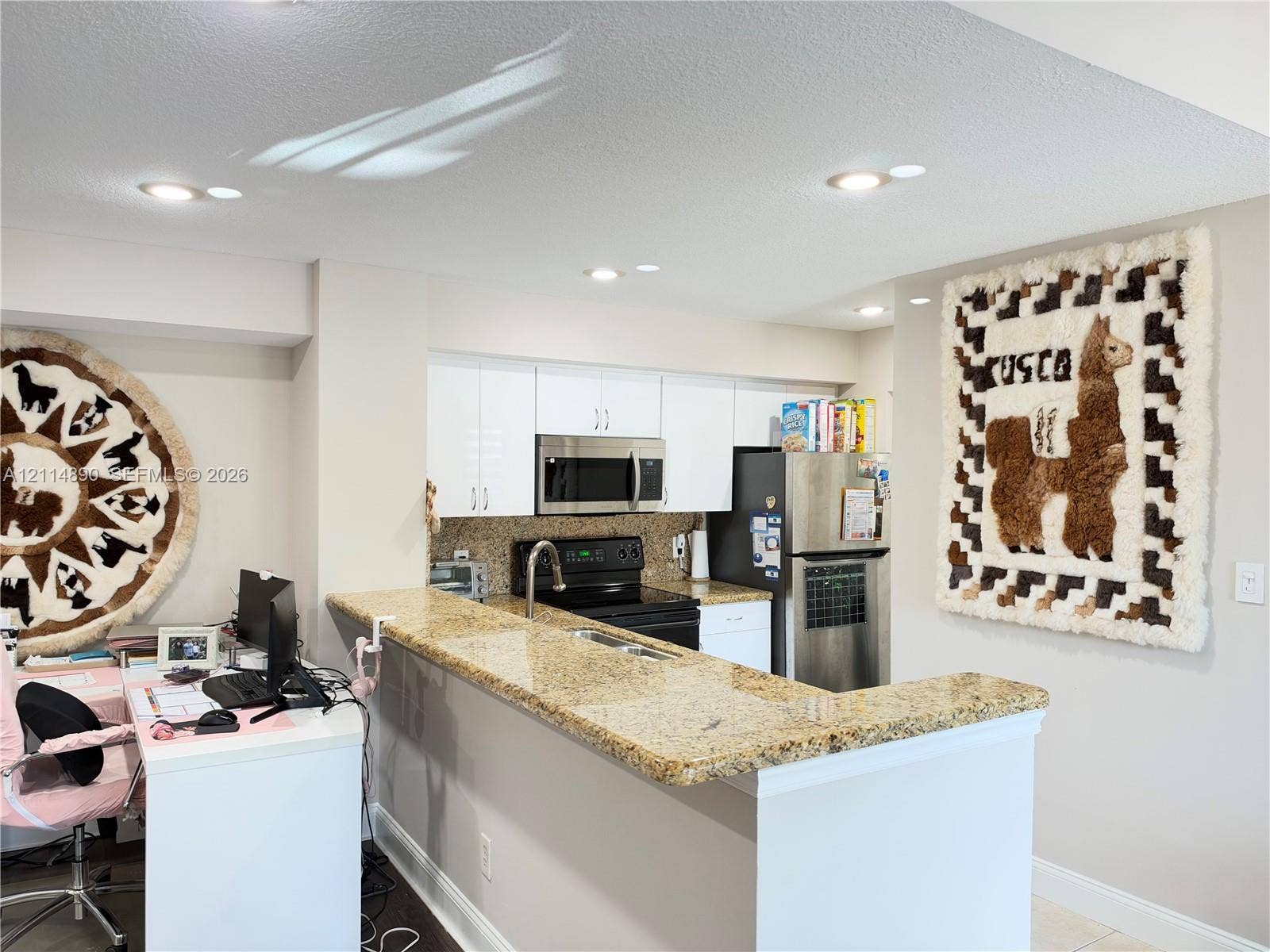 610 S Park Road, #28-1, Hollywood, FL 33021 Kitchen featuring white cabinetry, stone-finish countertops, stainless steel appliances, and recessed lighting