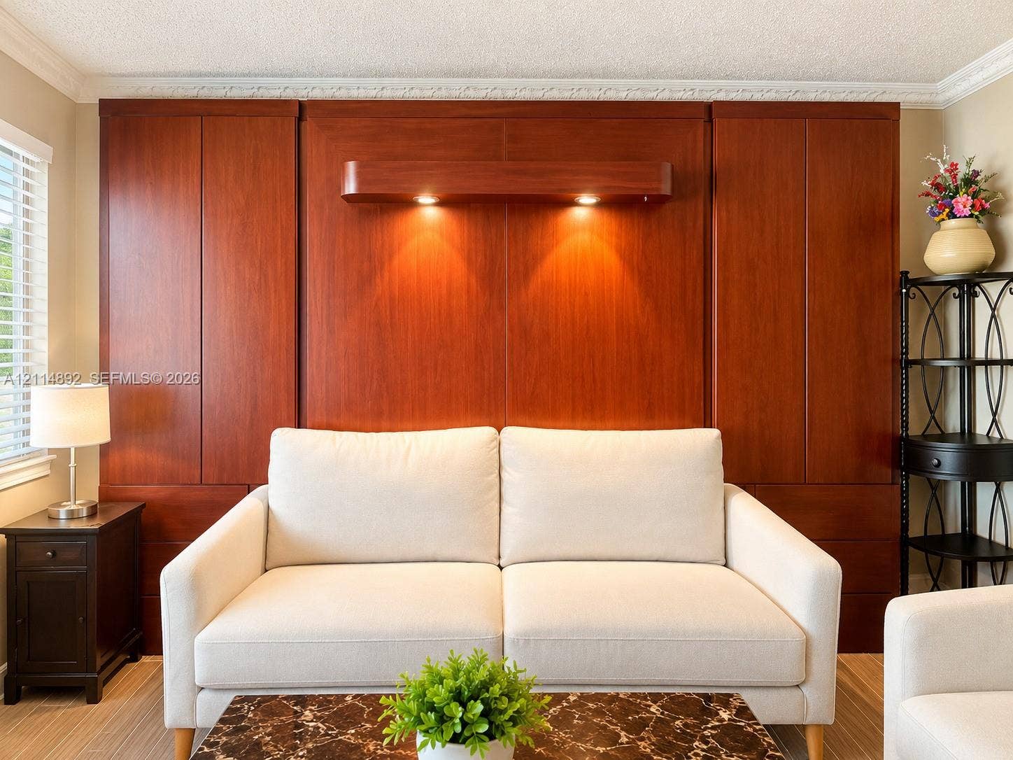 582 Durham U, #582, Deerfield Beach, FL 33442 Custom floor-to-ceiling wood cabinetry, integrated wall-mounted task lighting, and crown molding detail