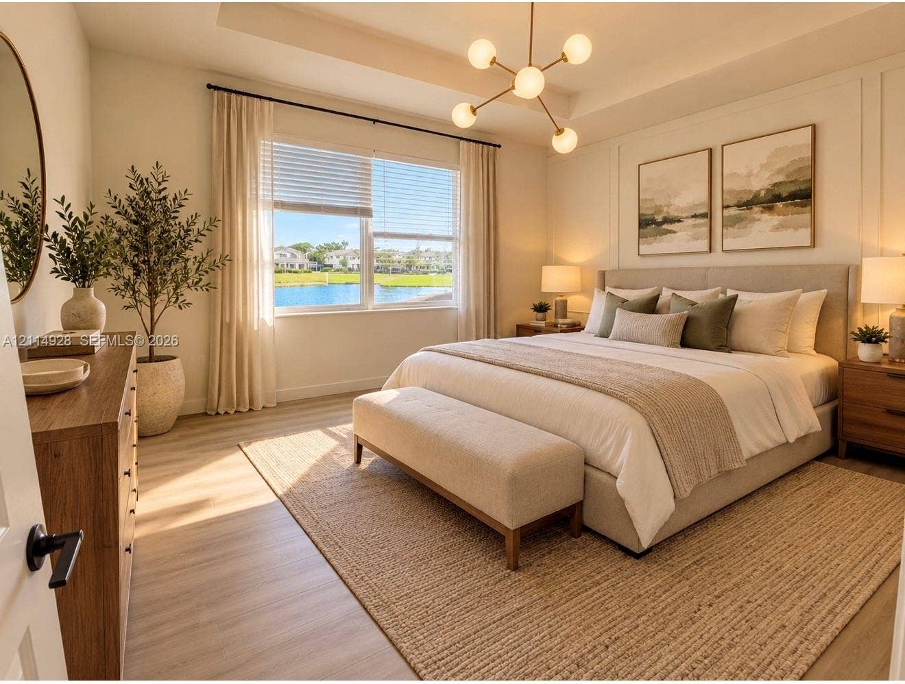 1411 SE 26th Road, Homestead, FL 33035 Tray ceiling, modern multi-arm chandelier, wood-finish flooring, paneled accent wall, and window with water backdrop