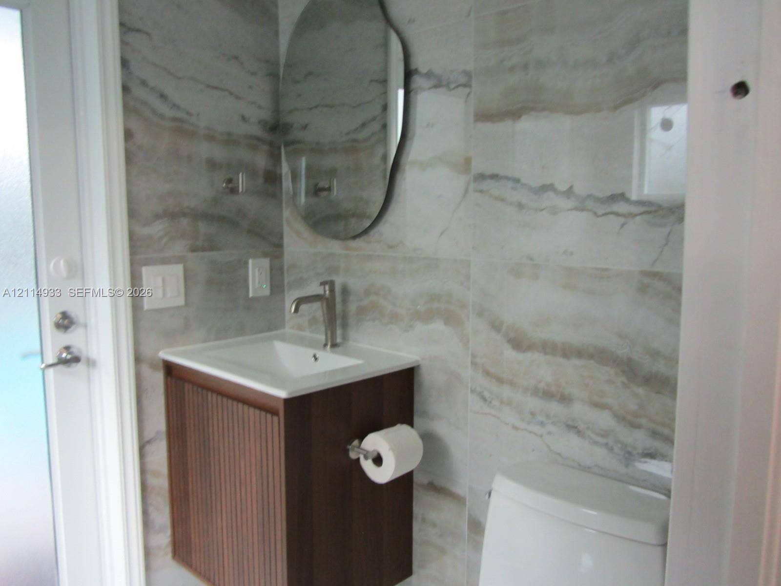 1001 Bella Vista Avenue, Coral Gables, Coral Gables, FL 33156 cabana bathroom.