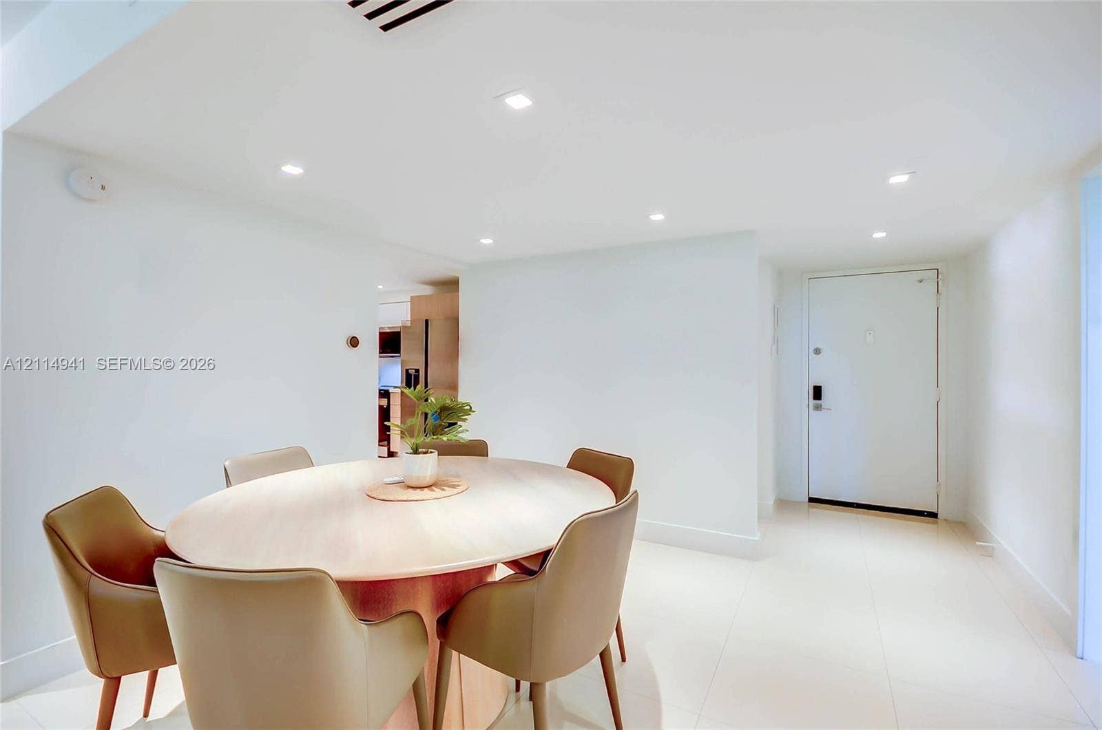 16175 Golf Club Road, #113, Weston, FL 33326 Recessed lighting, smooth finished ceiling, and light-toned tile flooring