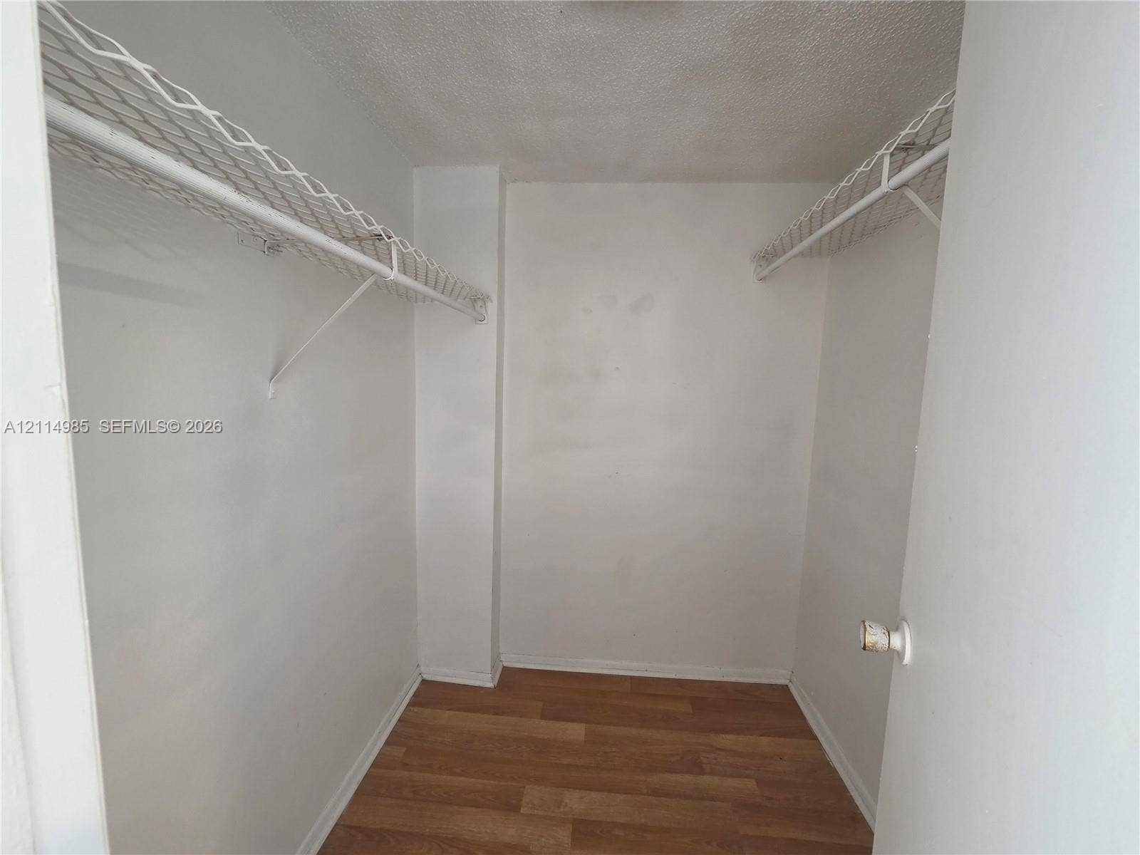 9441 Live Oak Place, #308, Davie, Davie, FL 33324 Storage afeaturing wood-finish flooring and dual overhead wire shelving units