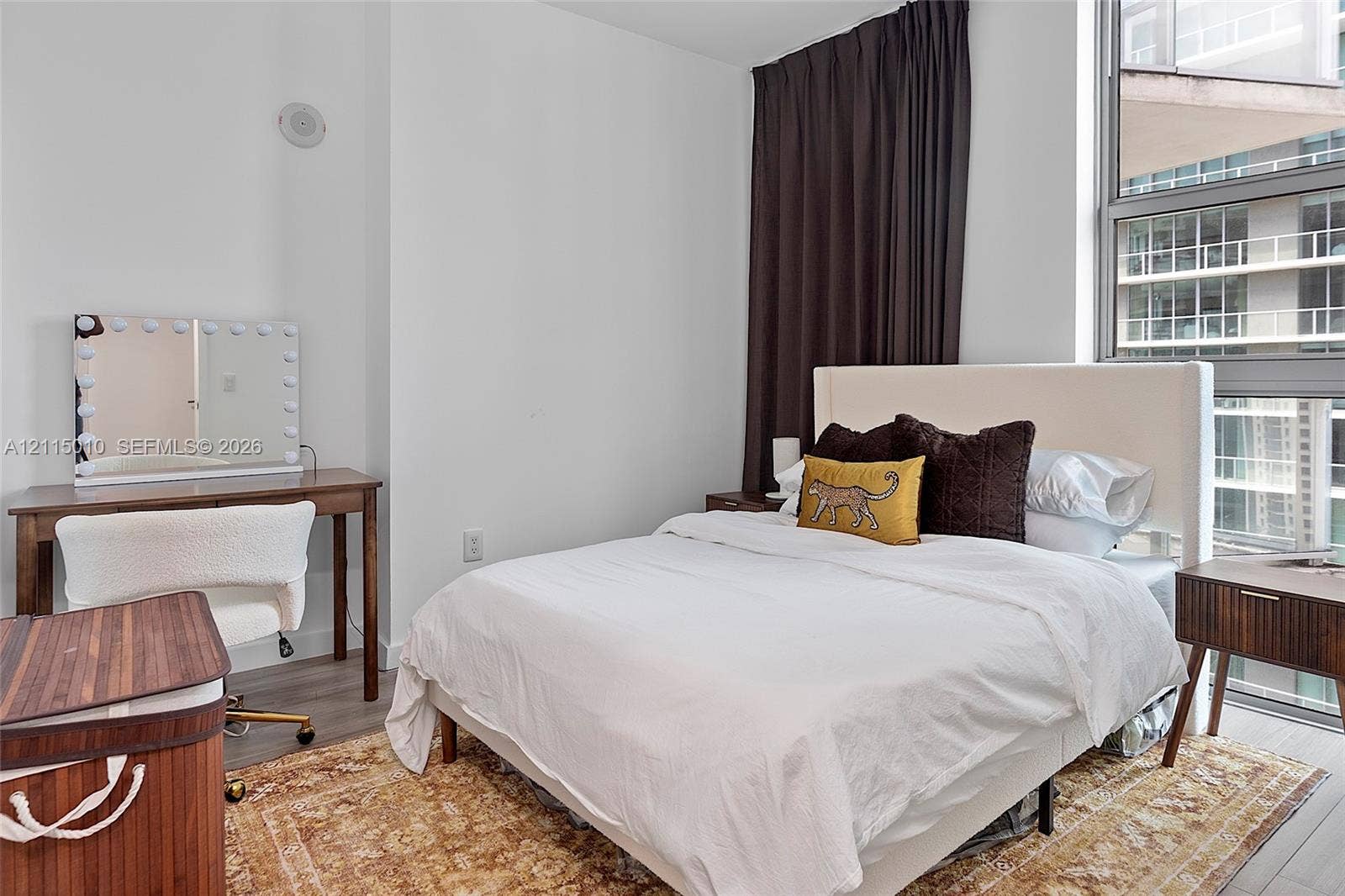 1100 S Miami Avenue, #2407, Miami, FL 33130 Floor-to-ceiling window featuring metal framing and wood-finish flooring