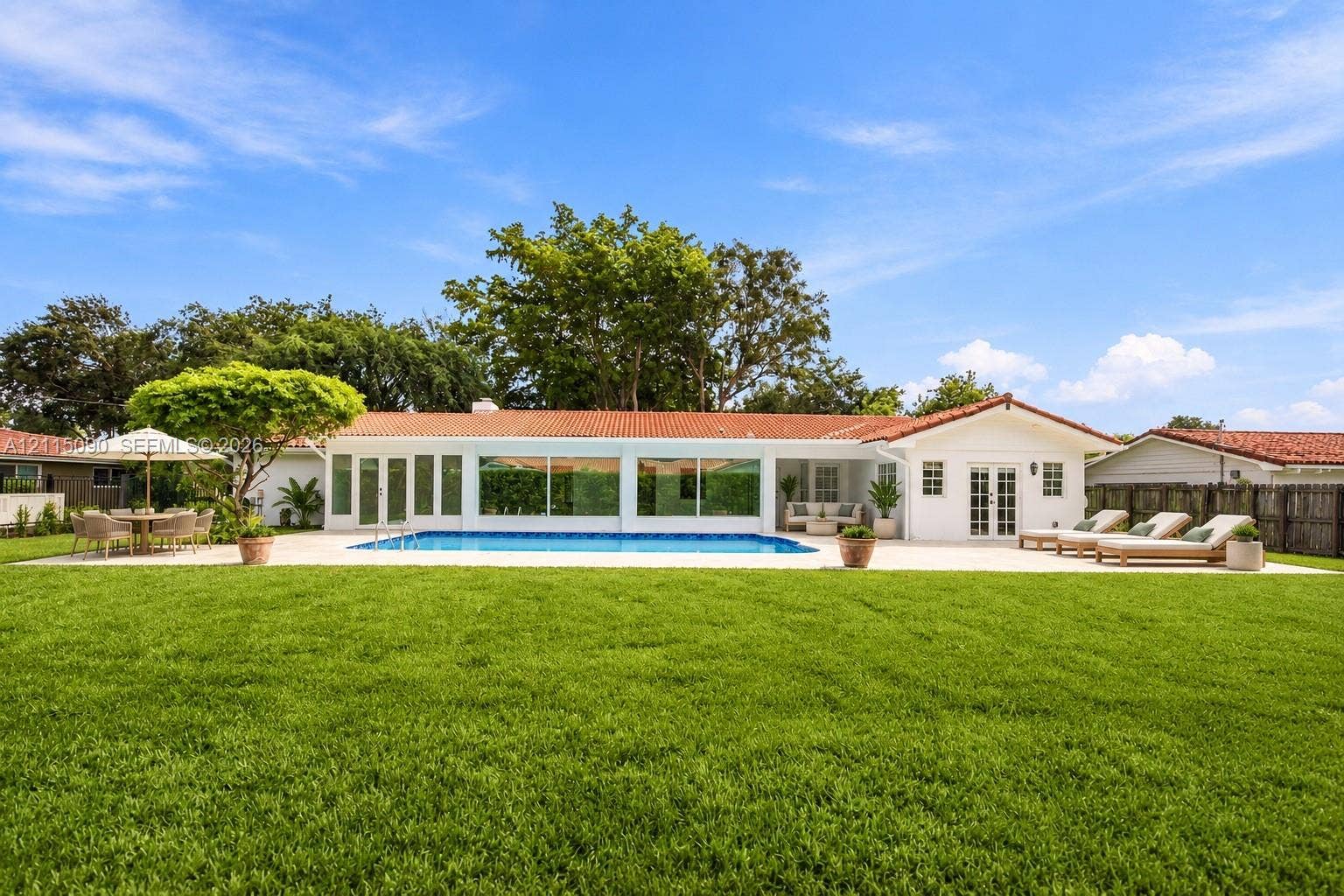 12900 SW 71st Avenue, Pinecrest, Pinecrest, FL 33156 Virtually Staged with outdoor furniture