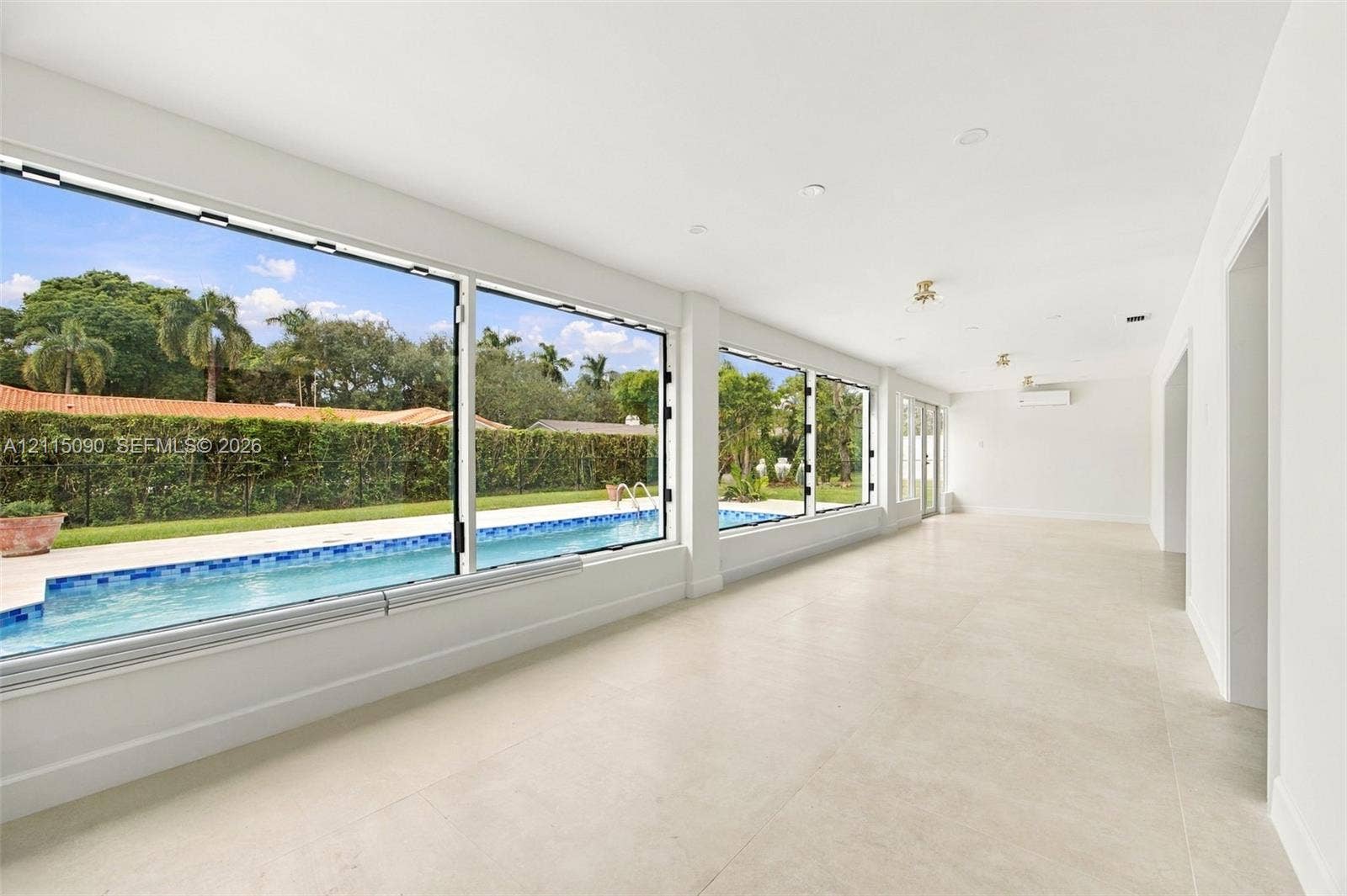 12900 SW 71st Avenue, Pinecrest, Pinecrest, FL 33156 Spacious Florida Room, can be used as Family Room, Breakfast Area, Kids Play Area etc.