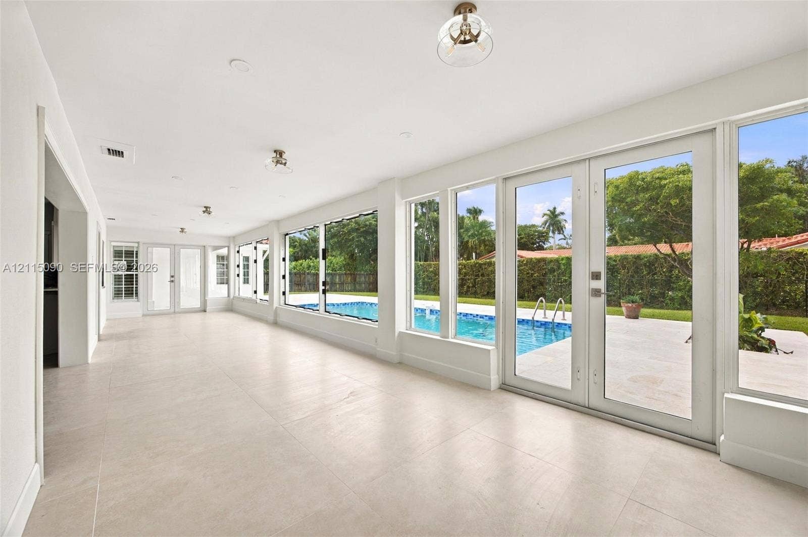12900 SW 71st Avenue, Pinecrest, Pinecrest, FL 33156 Spacious Florida Room, can be used as Family Room, Breakfast Area, Kids Play Area etc.