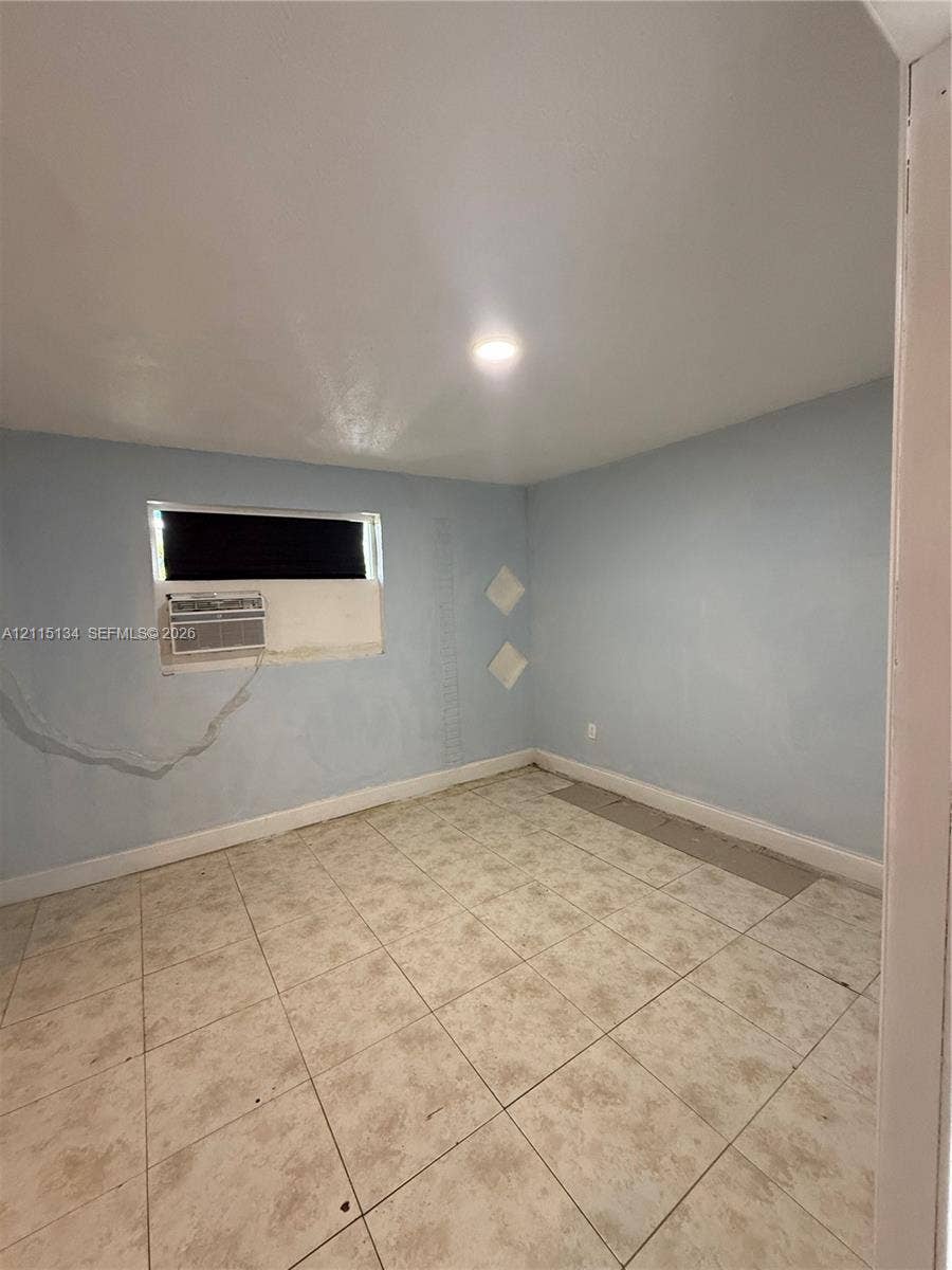 2816 SW 4th Place, #B, Fort Lauderdale, Fort Lauderdale, FL 33312 Interior room featuring neutral-toned tile flooring and a recessed lighting fixture