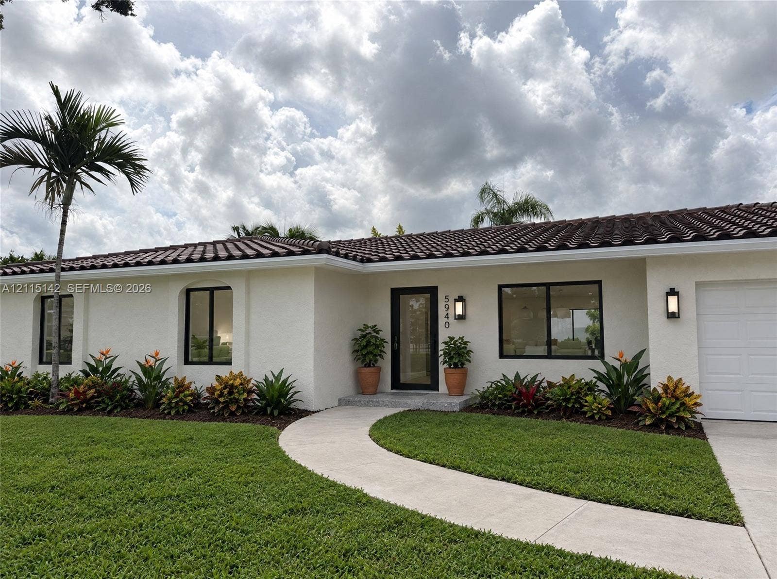 5940 SW 18th Street, Plantation, FL 33317 VIRTUAL RENDERING, NOT AN ACTUAL PHOTO. HOME IS UNDER CONSTRUCTION. Front exterior and 2-car garage shown as proposed per permitted plans; final construction, finishes, landscaping and furnishings may differ. Buyer to verify with developer.