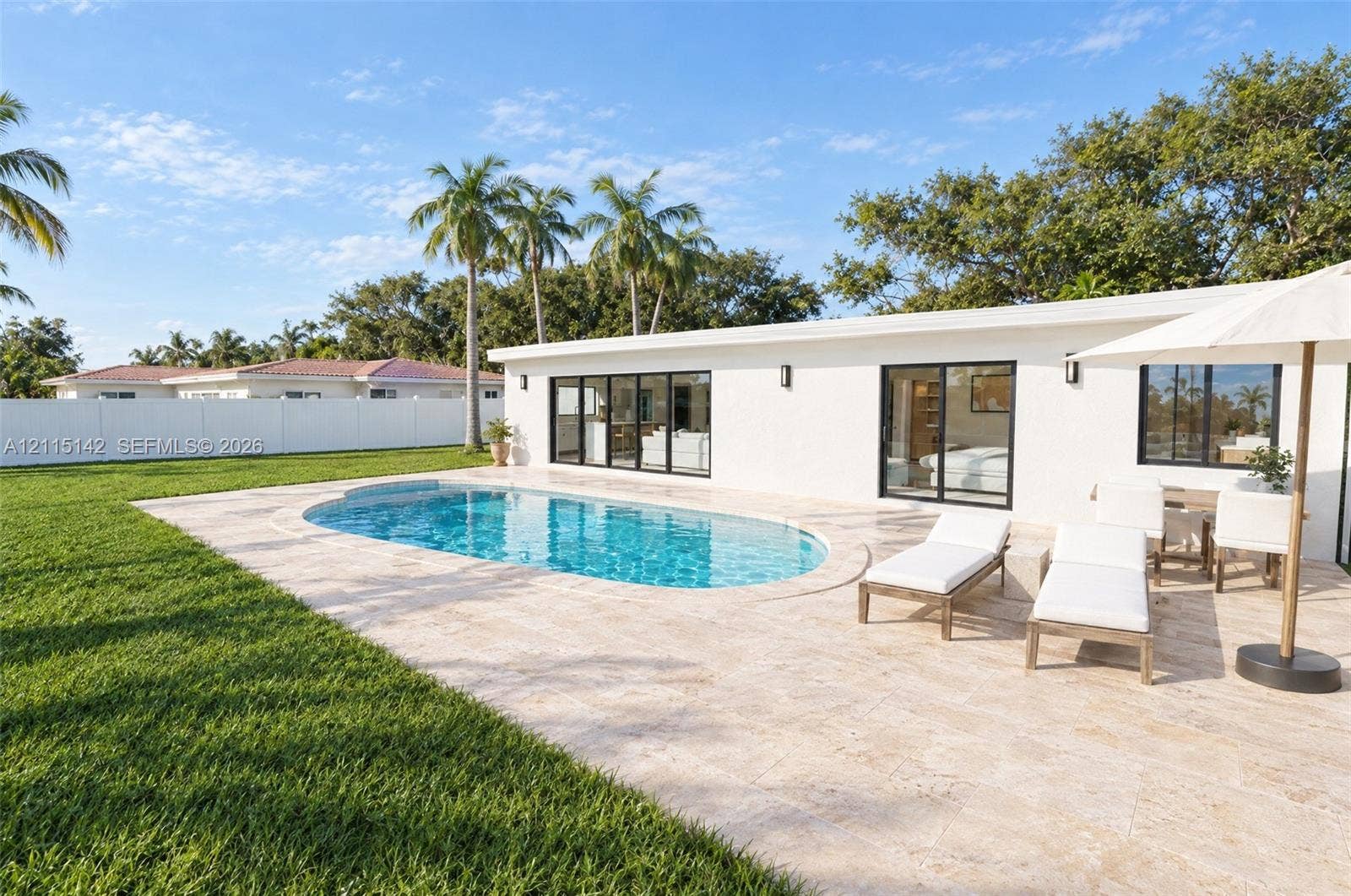 5940 SW 18th Street, Plantation, FL 33317 VIRTUAL RENDERING, NOT AN ACTUAL PHOTO. HOME IS UNDER CONSTRUCTION. Backyard and pool shown as proposed per permitted plans; final construction, finishes, landscaping and furnishings may differ. Buyer to verify with developer.