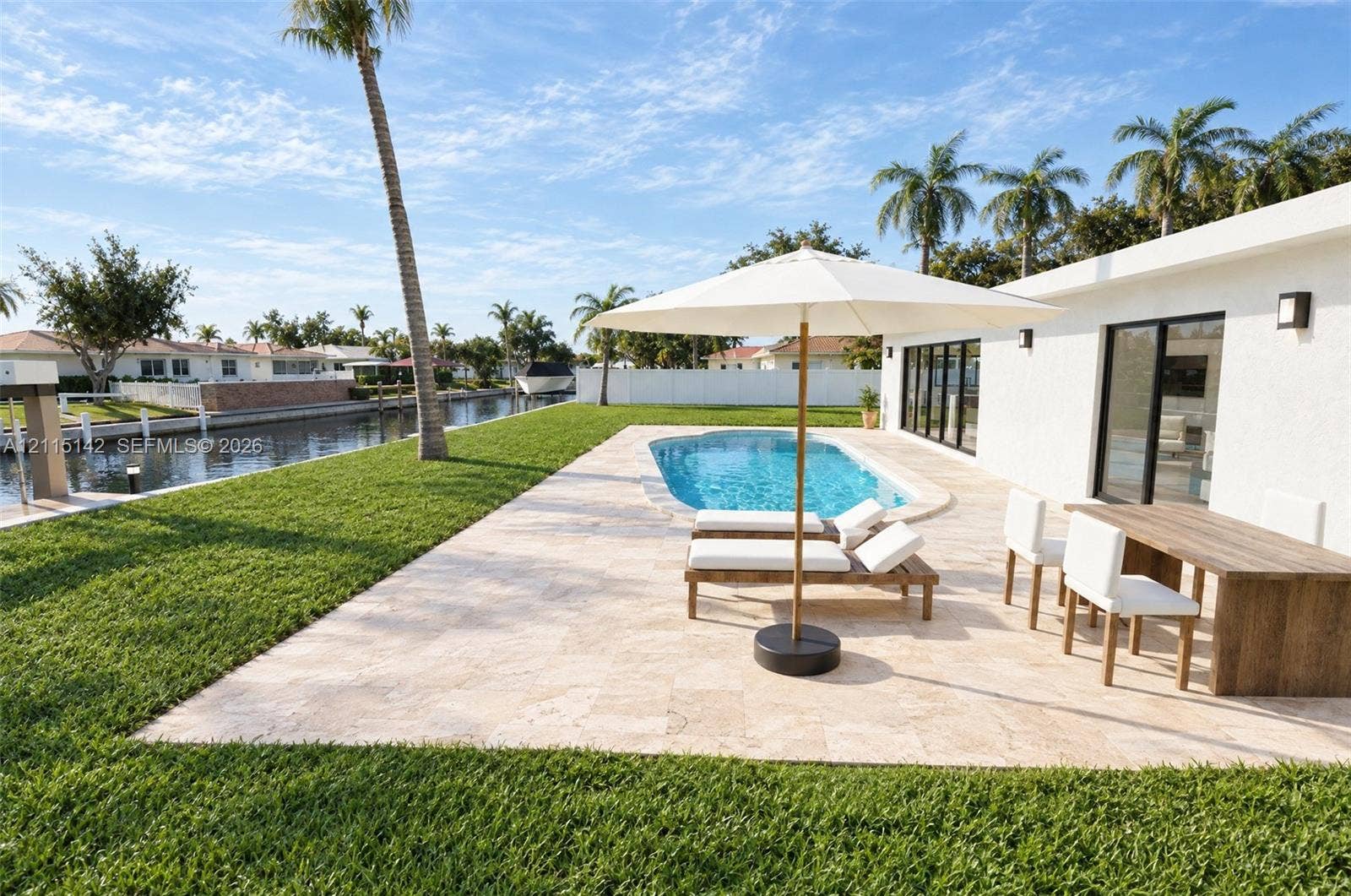 5940 SW 18th Street, Plantation, FL 33317 VIRTUAL RENDERING, NOT AN ACTUAL PHOTO. HOME IS UNDER CONSTRUCTION. Rear terrace and pool shown as proposed per permitted plans; final construction, finishes, landscaping and furnishings may differ. Buyer to verify with developer.