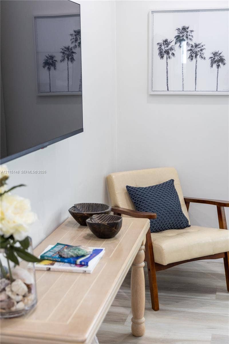Light-toned wood-finish flooring with a neutral interior wall palette