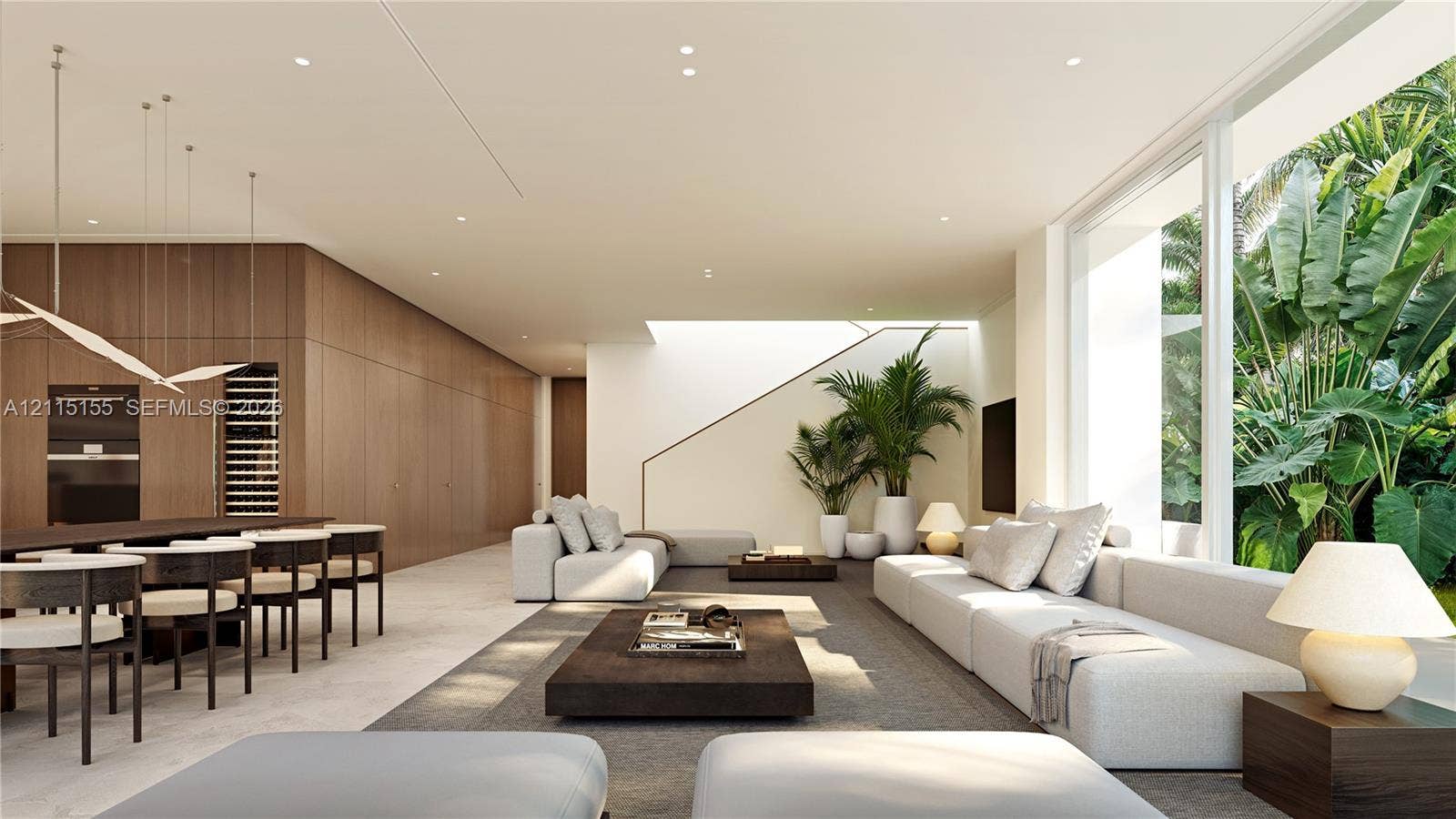 3721 S Le Jeune Road, Miami, FL 33146 Open-concept living space featuring floor-to-ceiling glass windows, wood-paneled cabinetry, built-in wall oven, integrated wine storage, and recessed lighting