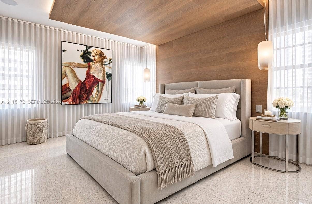 16 Island Avenue, #5C, Miami Beach, FL 33139 Wood-finish paneled ceiling and accent wall, polished light-toned stone flooring, and suspended cylindrical pendant lighting