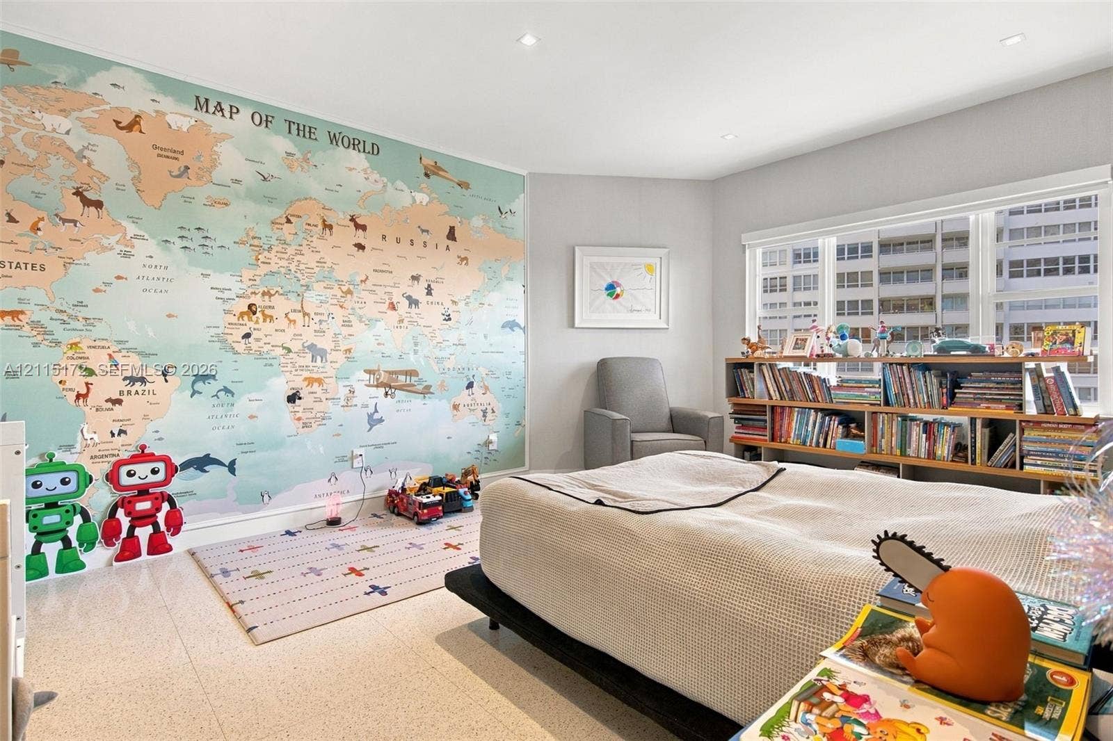 16 Island Avenue, #5C, Miami Beach, FL 33139 Room featuring a large-scale map wall mural, recessed ceiling lighting, and large windows with integrated blinds, finished with light-toned stone-style flooring