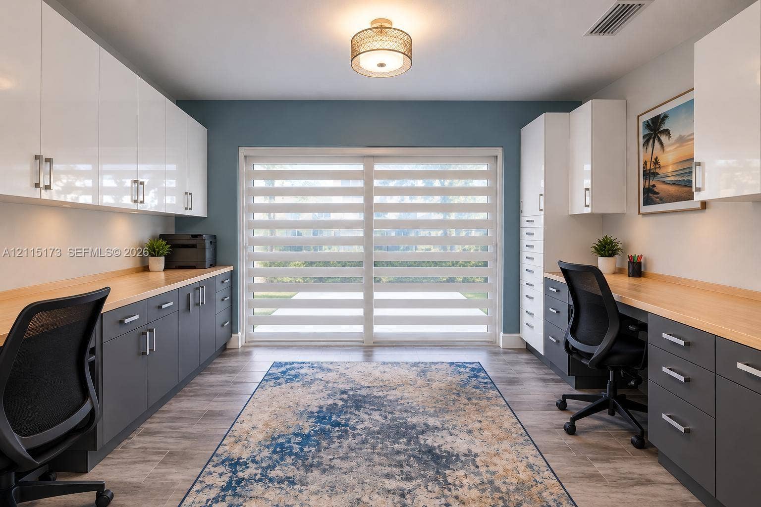 Custom built-in cabinetry with high-gloss white upper and matte grey lower storage, wood-finish countertops, tile flooring, and sliding glass doors
