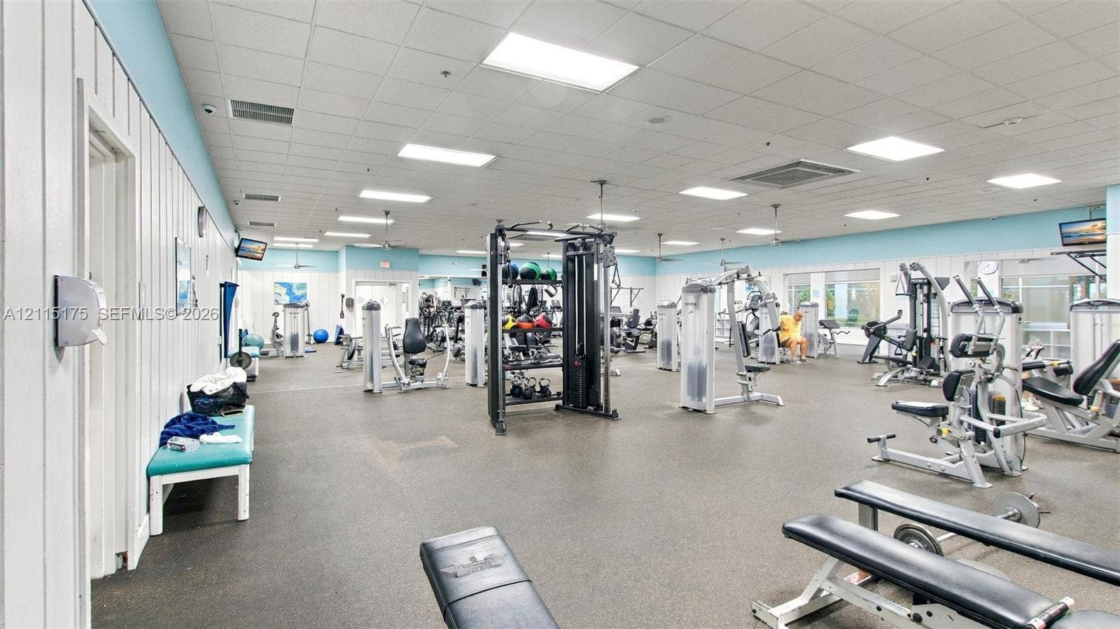 324 Seville N, Delray Beach, FL 33446 Fitness center featuring a drop ceiling with recessed lighting