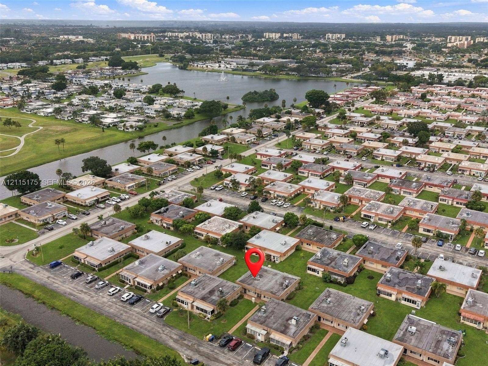 324 Seville N, Delray Beach, FL 33446 Aerial perspective showing a red pin over the unit