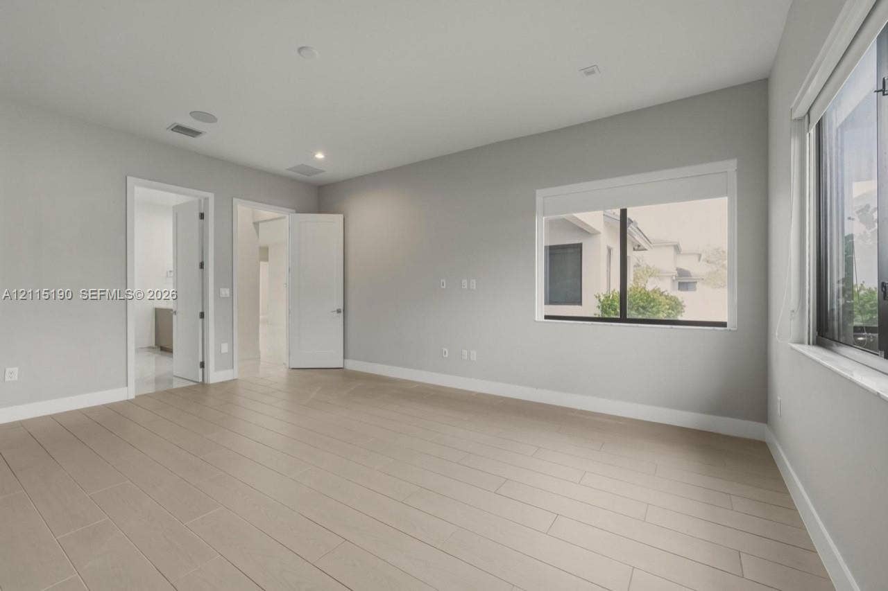Bedroom with adjoining bathroom.