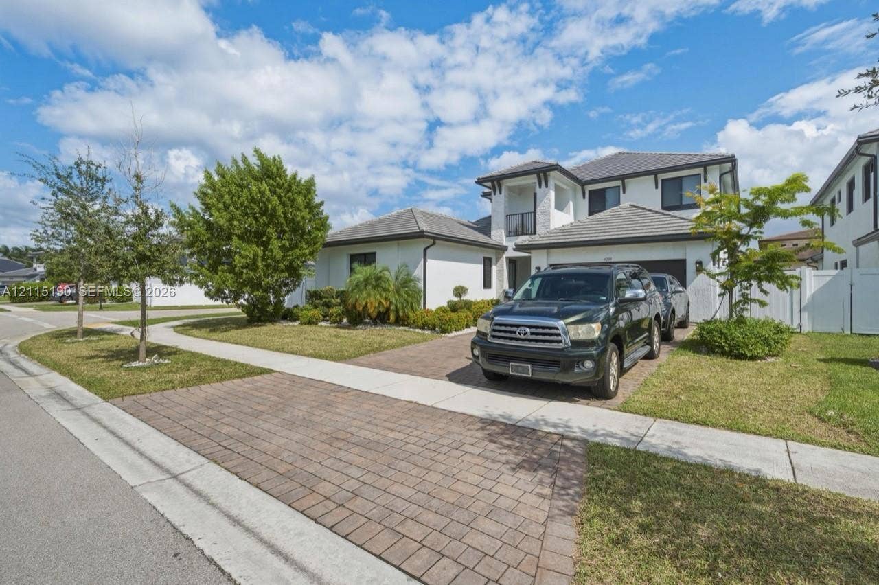 Angled front exterior and driveway.