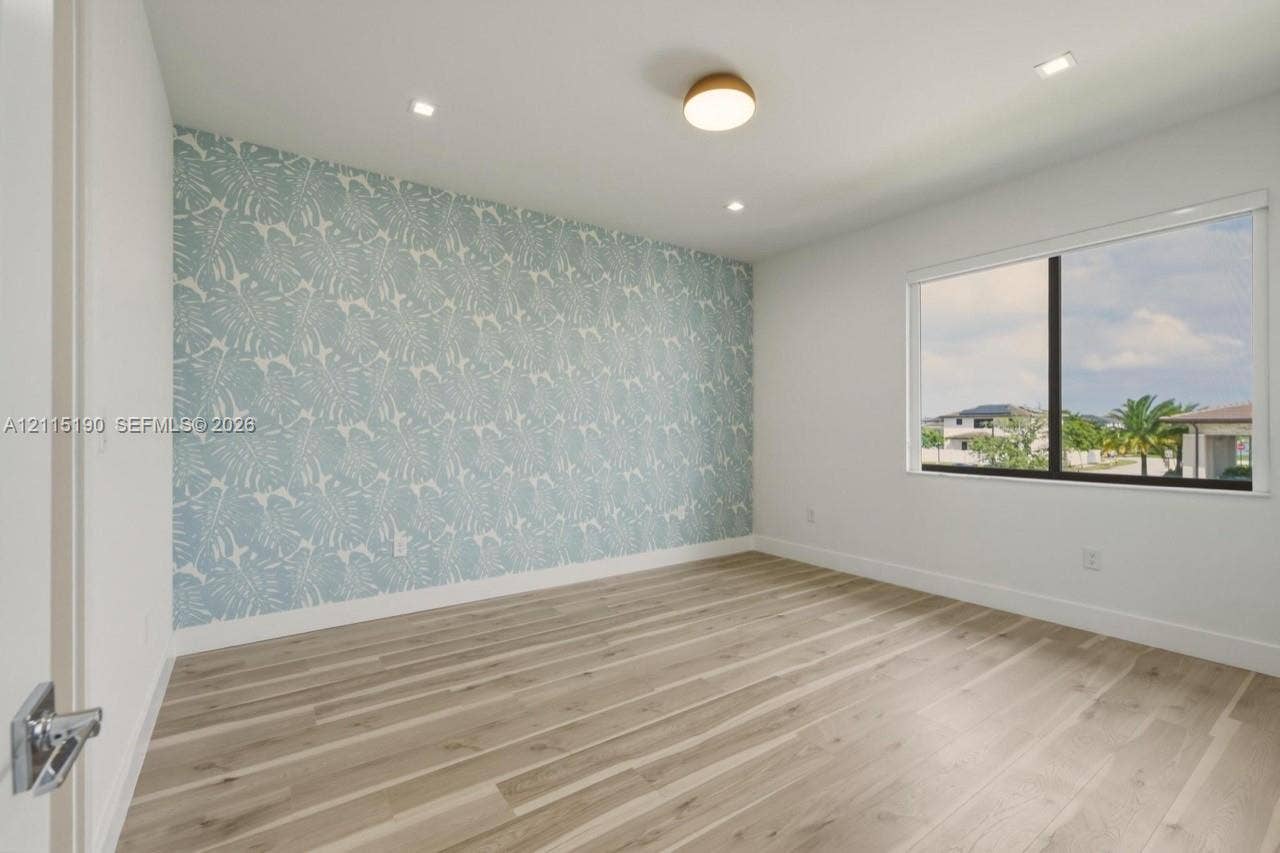 Bedroom with accent wall.
