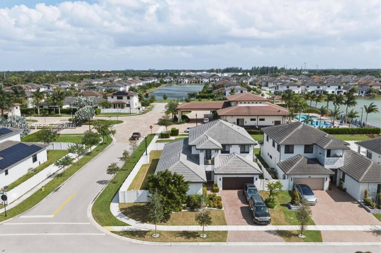 Front aerial view of the home and surrounding community.
