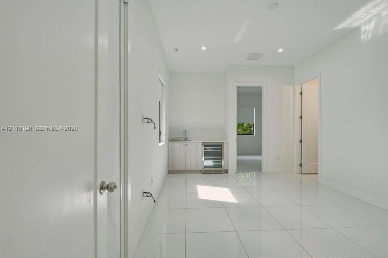 Additional interior area with wet bar.