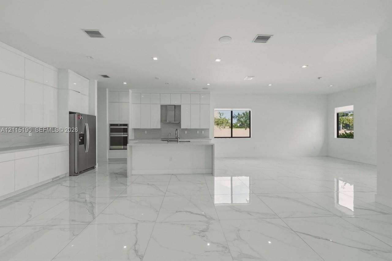 Kitchen and adjacent dining area.