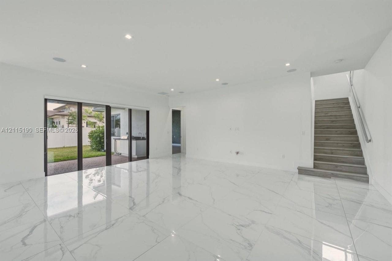 Main living area with sliding doors to the patio.