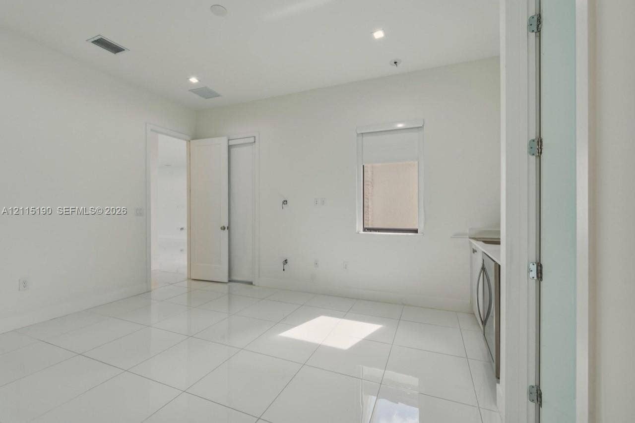 Additional living area with wet bar.