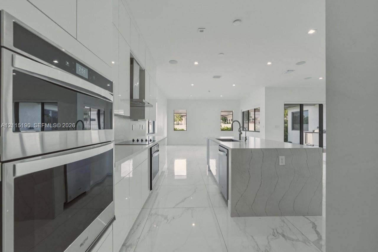 Kitchen appliances and island detail.