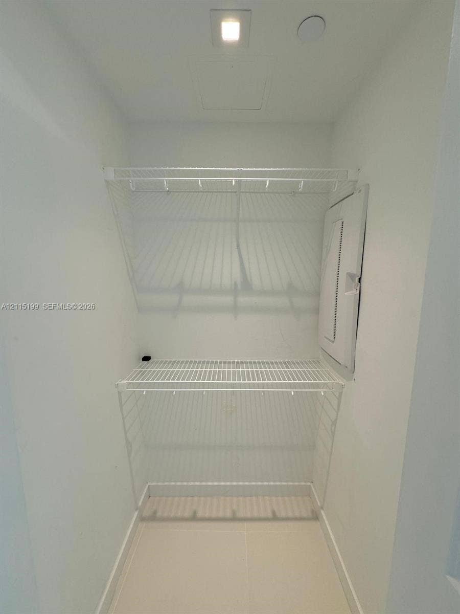 1600 NE 1st Avenue, #3120, Miami, FL 33132 Storage space featuring tiered white wire shelving and overhead recessed lighting