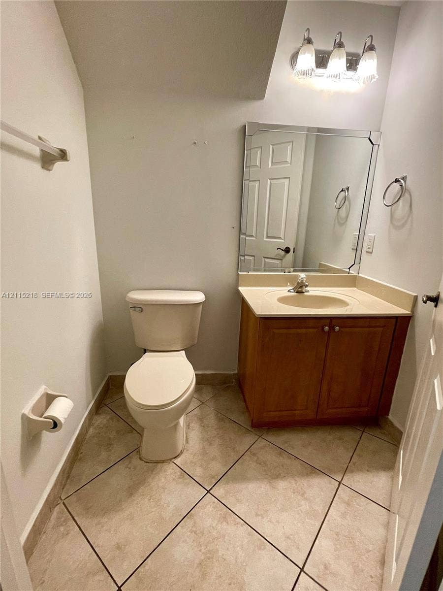 12738 SW 49th Court, #12738, Miramar, Miramar, FL 33027 Walk-in storage space featuring multi-level white wire shelving and tile flooring