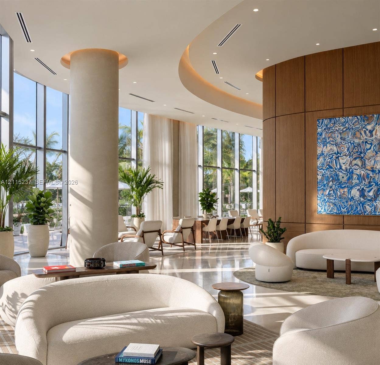 2411 Laguna Circle, #802, North Miami, North Miami, FL 33181 Floor-to-ceiling windows, curved architectural ceiling with recessed lighting, structural cylindrical column, and paneled wood-finish wall accents
