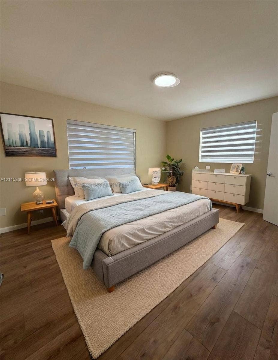 9015 SW 138th Street, #16-2, Miami, Miami, FL 33176 Wood-finish flooring, dual windows with fitted light-filtering shades, and a ceiling-mounted light fixture
