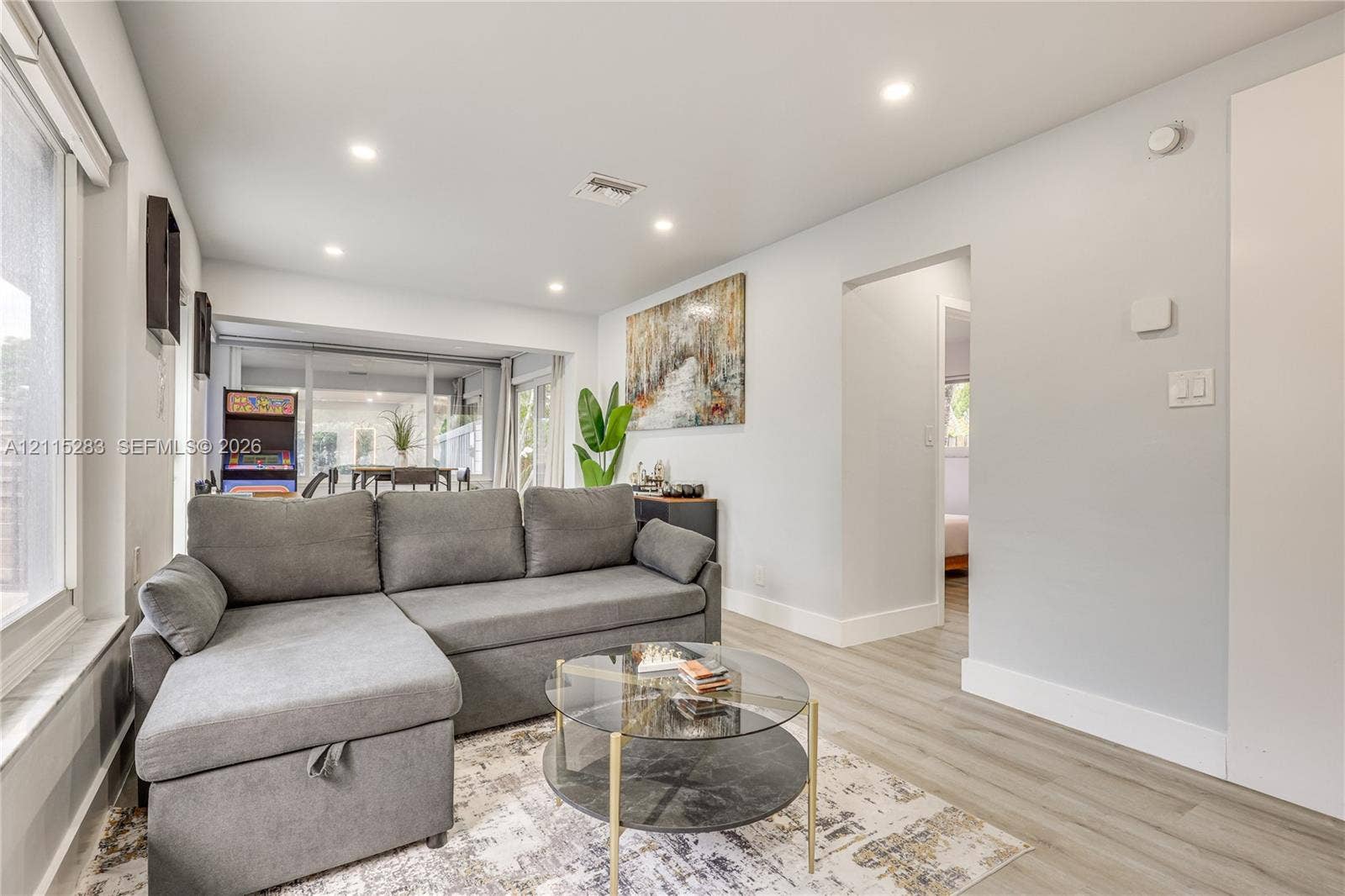 1619a NE 25th Street, #A, Wilton Manors, Wilton Manors, FL 33305 Recessed lighting, wood-finish flooring, and expansive windows
