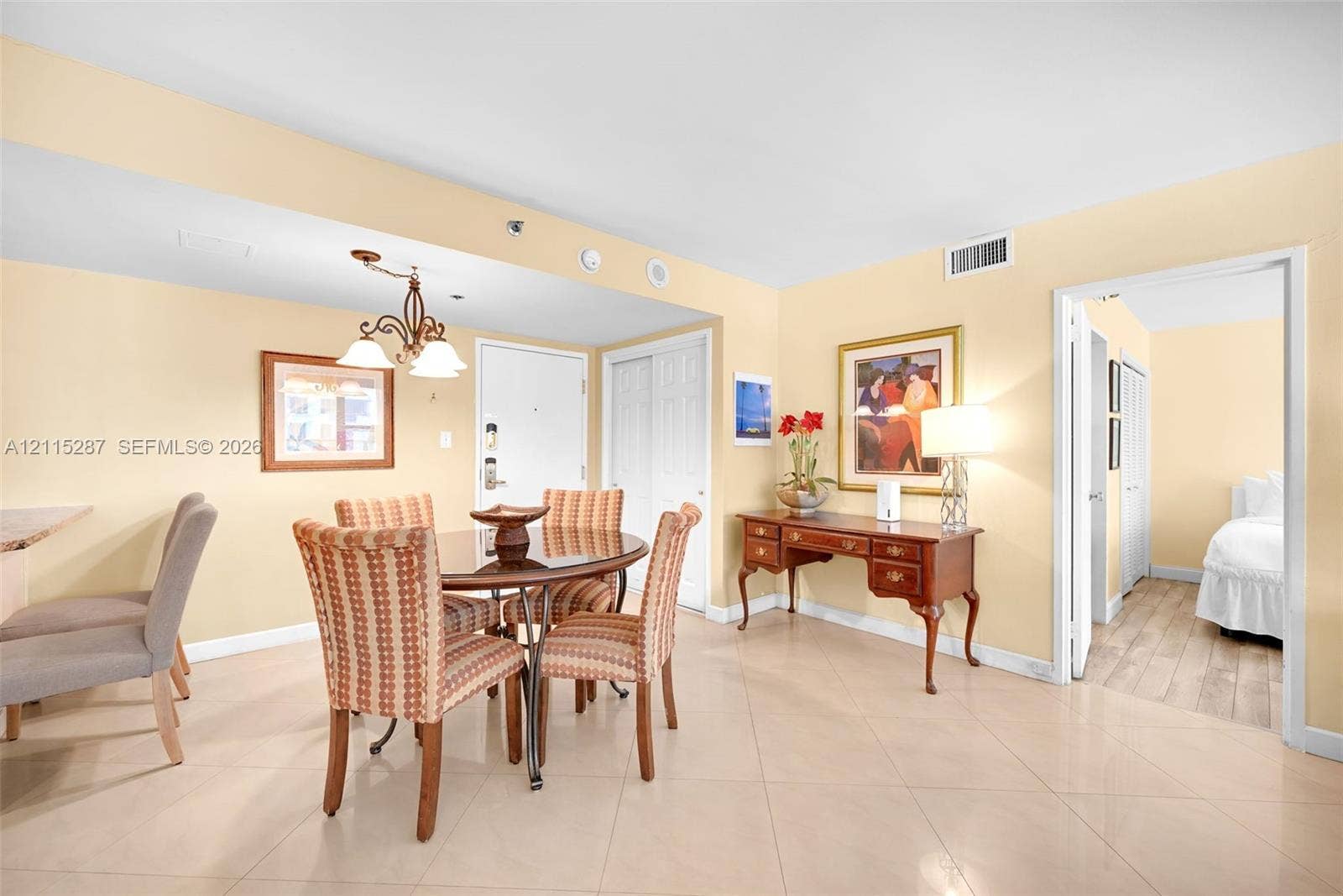 5225 Collins Avenue, #511, Miami Beach, FL 33140 Light-toned ceramic tile flooring, neutral wall palette, and white multi-panel interior doors