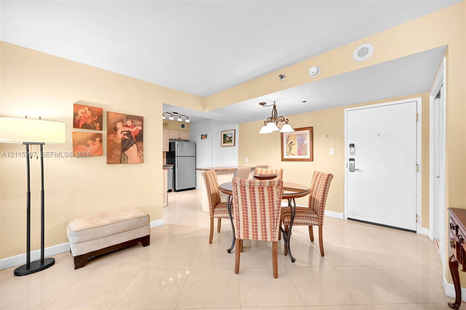 5225 Collins Avenue, #511, Miami Beach, FL 33140 Open floor plan featuring tile flooring, recessed lighting, and a multi-light chandelier