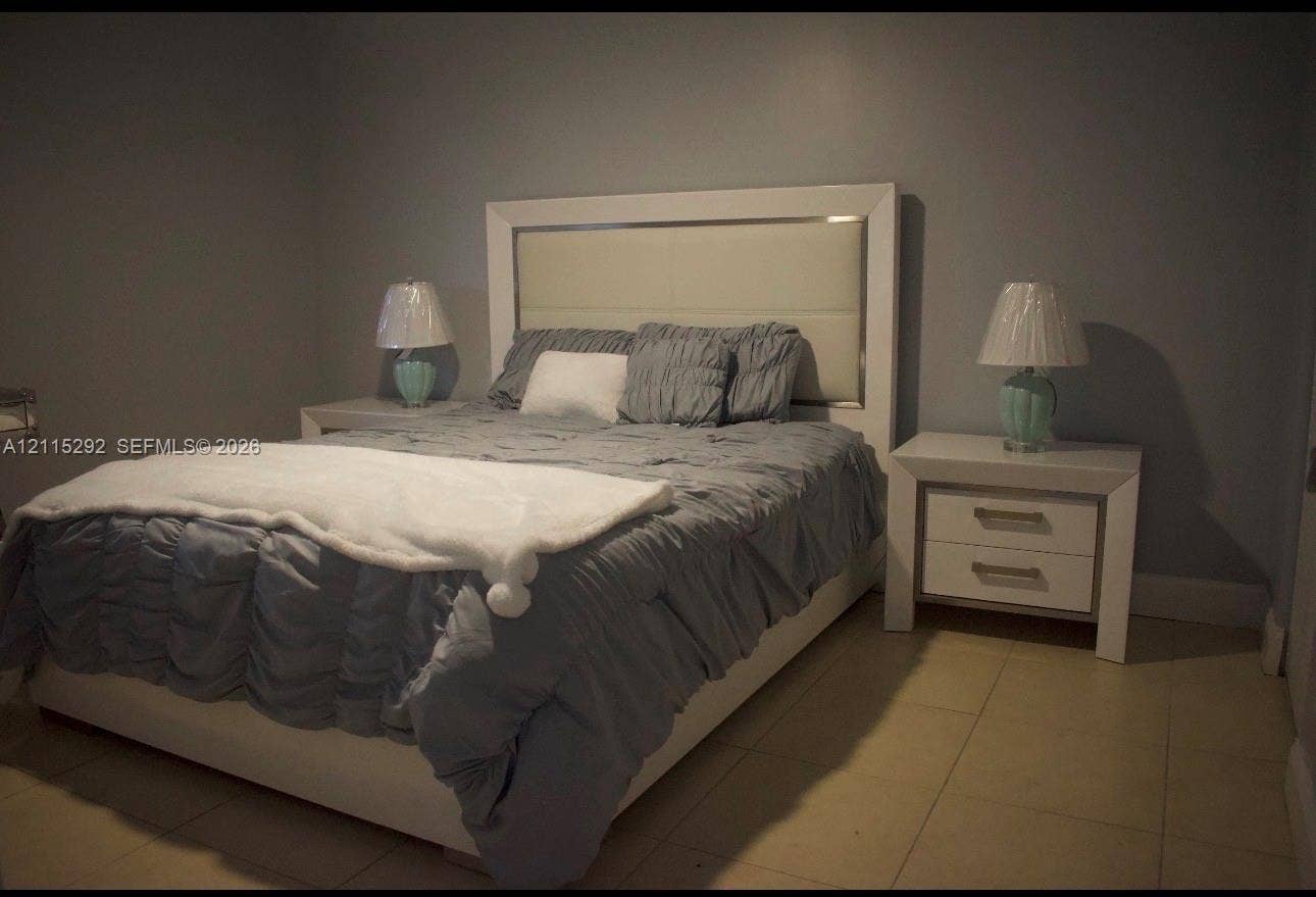 2700 SW 55th Street, #1, Dania, Dania Beach, FL 33312 Neutral-toned interior space featuring light-colored ceramic tile flooring