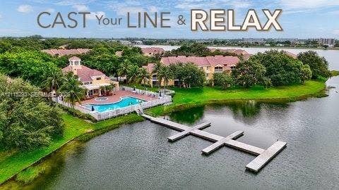 2642 NW 33rd Street, #1902, Oakland Park, Oakland Park, FL 33309 Waterfront community featuring a swimming pool, spa, and private multi-slip dock extending into the lake