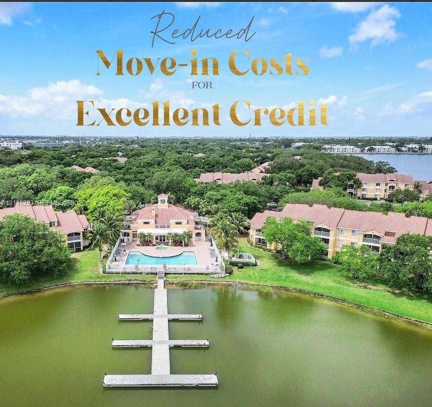 2642 NW 33rd Street, #1902, Oakland Park, Oakland Park, FL 33309 Waterfront multi-building residential complex featuring a community swimming pool, paver deck, and private T-shaped boat dock