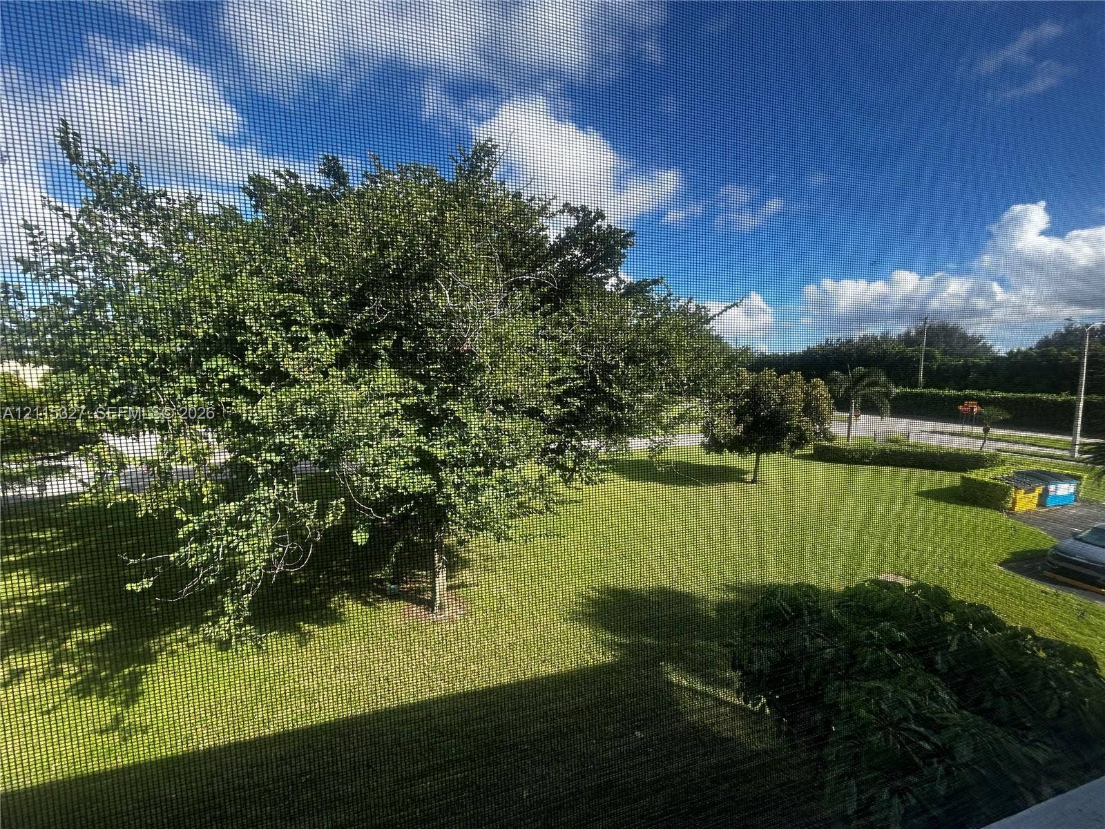 335 Brighton H, #H, Boca Raton, Boca Raton, FL 33434 Expansive outdoor grounds featuring mature trees and established lawn areas