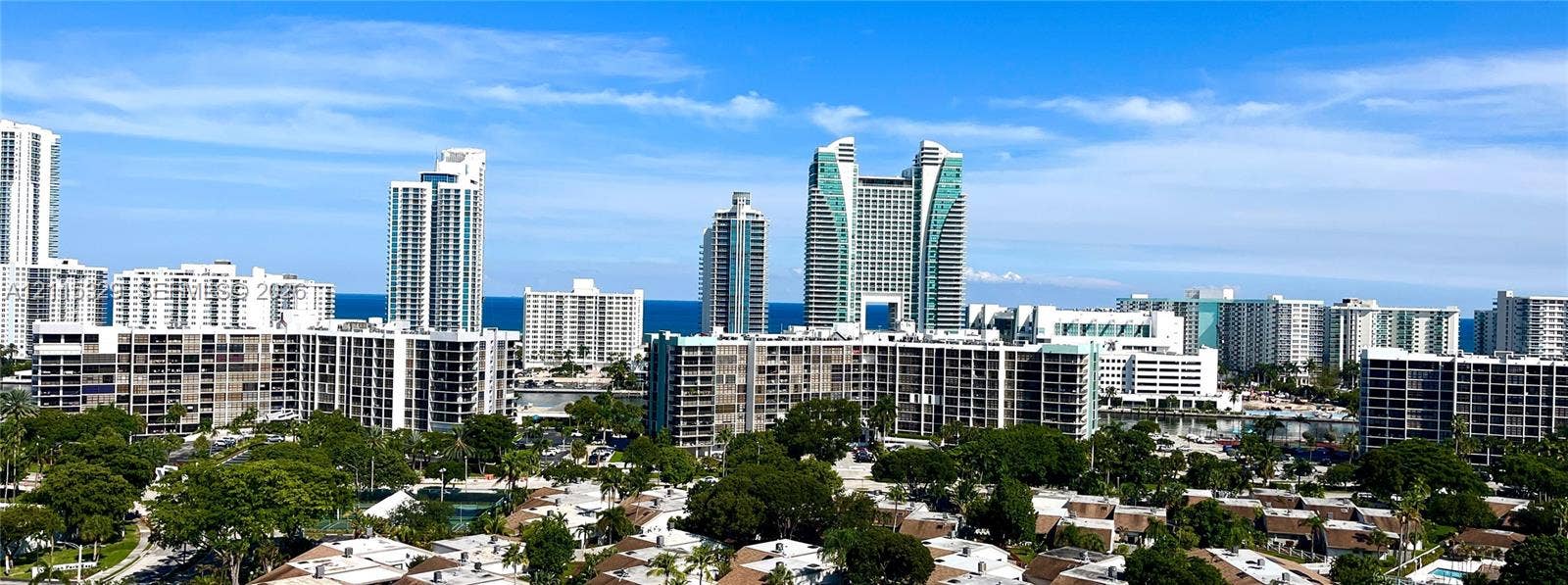 2500 Parkview Drive, #1705, Hallandale Beach, Hallandale Beach, FL 33009 Panoramic cityscape featuring high-rise architecture and expansive water frontage