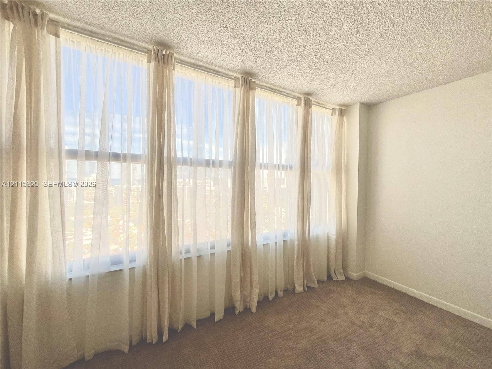 2500 Parkview Drive, #1705, Hallandale Beach, Hallandale Beach, FL 33009 Expansive floor-to-ceiling windows featuring natur